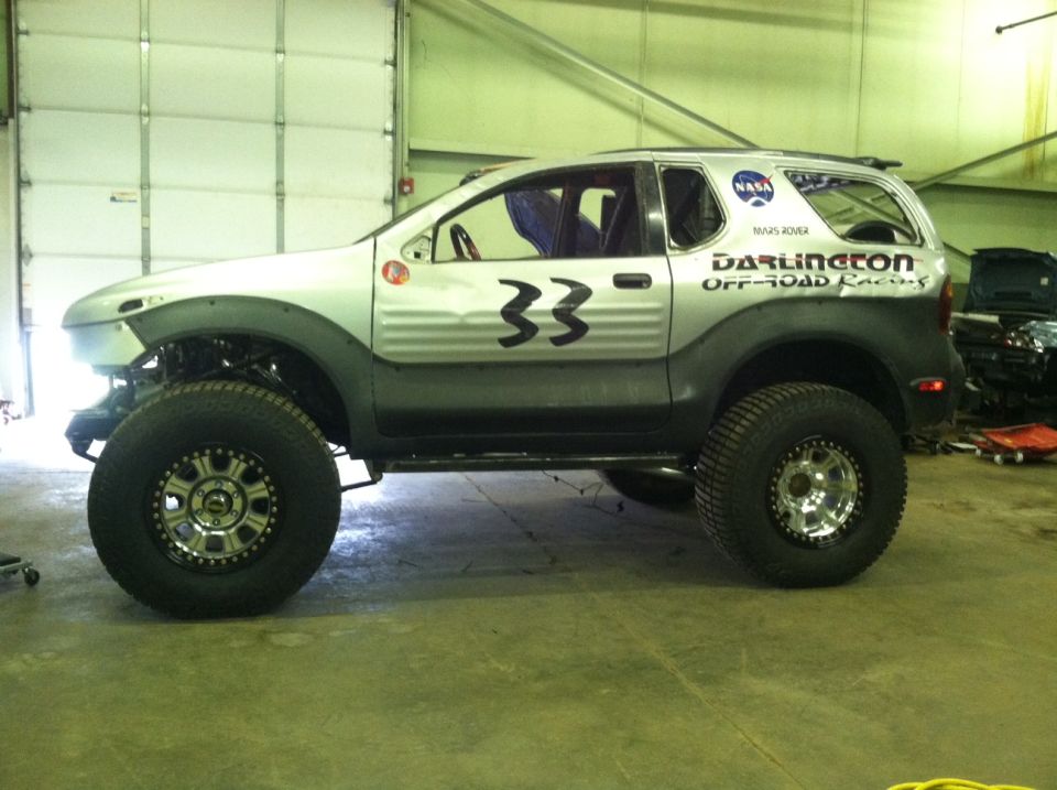1999 Isuzu VehiCross modified for off-road racing, number 33 on door, NASA and Darlington Off-Road Racing decals