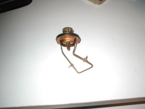 1994 Ford Crown Victoria - A single car thermostat part is shown against a plain background.