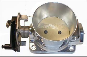 1998 Ford Crown Victoria - polished aluminum Accufab throttle body with twin bore blades and side throttle linkage shown against a gray background.