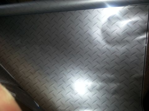1994 Ford Bronco - Diamond plate metal sheet is shown, possibly for a custom build or repair.