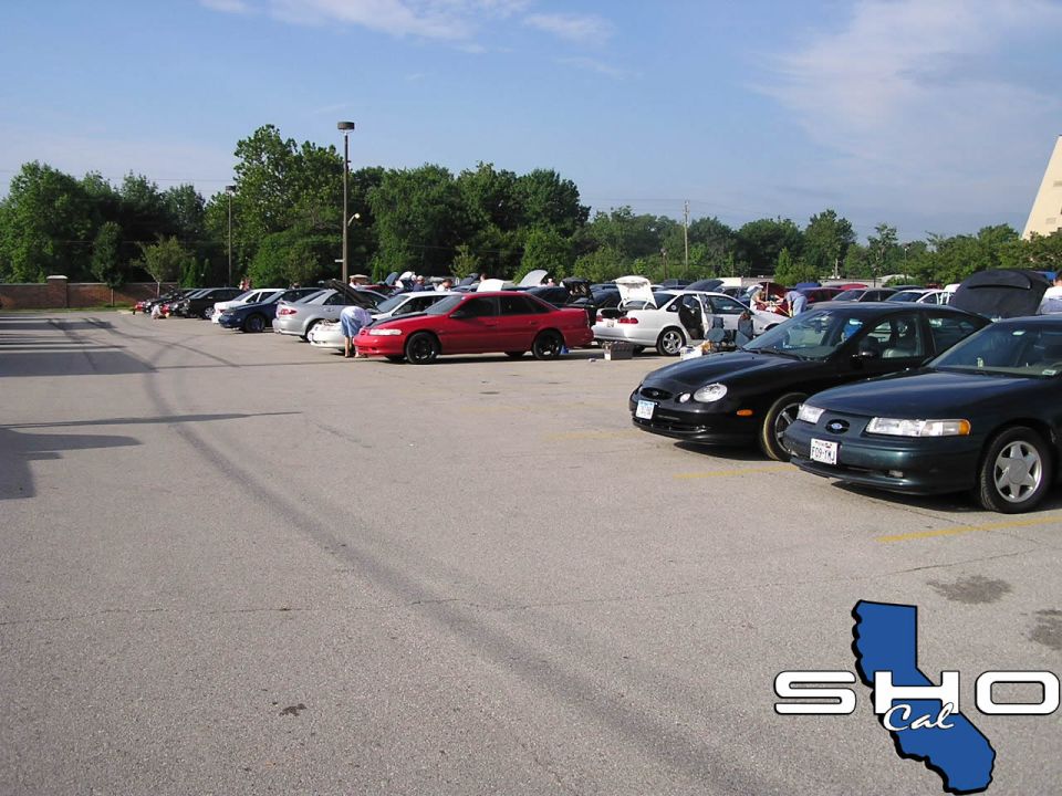 1993 Ford Taurus and other cars parked in a lot