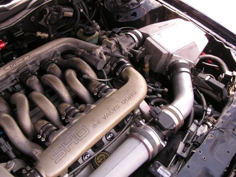 1993 Ford Taurus - Close-up of a Ford SHO 24 valve DOHC engine, focusing on the intake system.