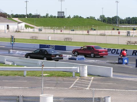 1993 Ford Taurus - Two sedans prepare for a drag race at Indianapolis Raceway Park.