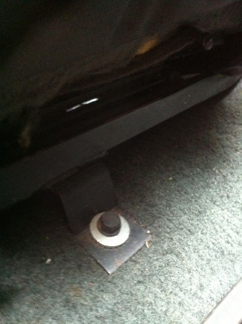 1992 Ford F-150 - Old aftermarket bench seat mounting.