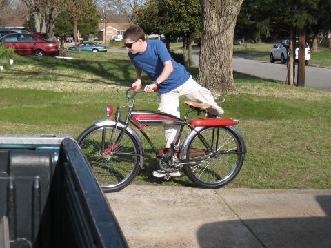 1994 Ford Bronco - Man with a vintage bicycle on a sunny day.