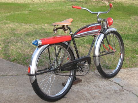 1994 Ford Bronco - A vintage J.C. Higgins bicycle with a red frame accent and chrome fenders is displayed outdoors.