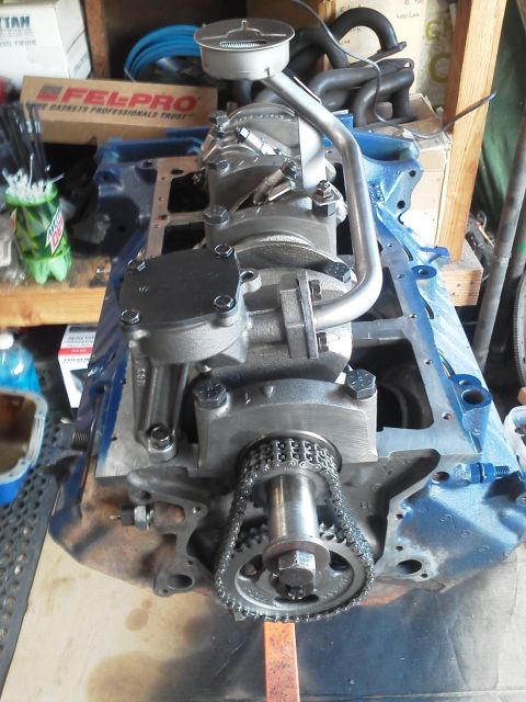 1988 Ford Bronco - Engine block assembly, likely a Ford V8, with timing chain and oil pump.