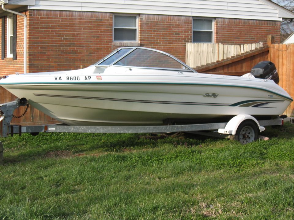White Sea Ray boat on a trailer, side view, with VA 8600 AP registration on hull
