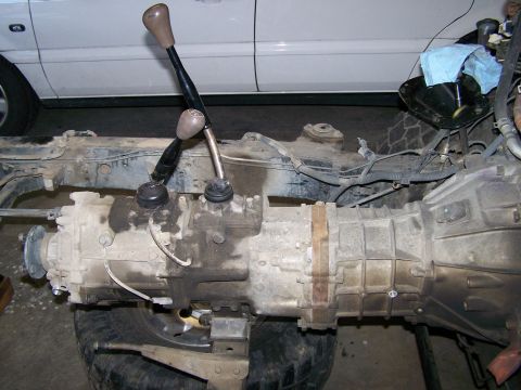 1988 Suzuki Samurai - Vehicle's transfer case and transmission assembly with shifters is shown, possibly for a Suzuki Samurai.