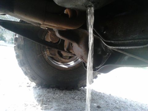 1988 Ford Bronco - draining the fluids so I can pull my motor. don't think there should be 2 gallons of clean water inside my oil