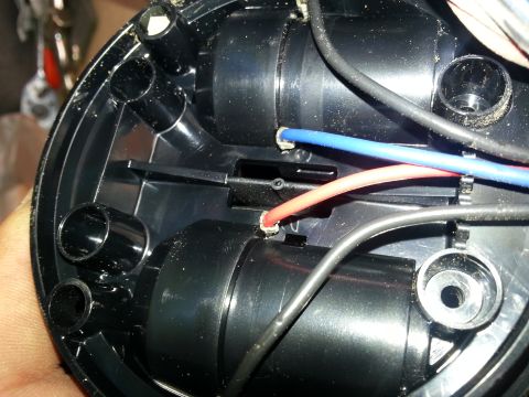 1994 Ford Bronco - Close-up view of internal electrical components within a black plastic housing.