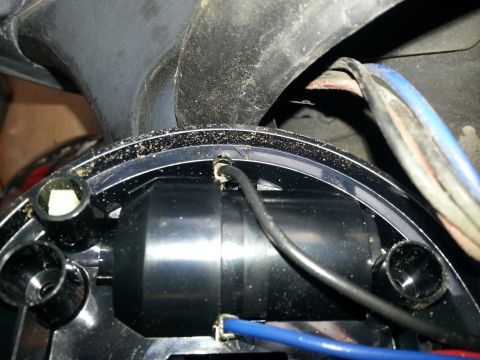 1994 Ford Bronco - Detail of an automotive component, showing electrical connections and internal structure.