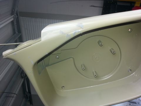 1994 Ford Bronco - Vehicle body panel with mounting points and a circular recess, likely interior or undercarriage component.