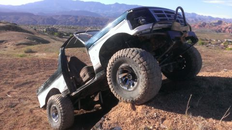 1994 Ford Bronco - This modified Ford Bronco is shown off-road with its doors removed.
