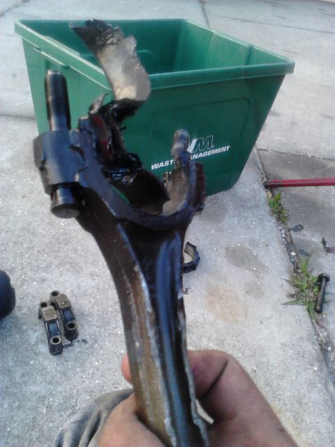 1988 Ford Bronco - connecting rod with a bearing fried on to it. can see how hot it got. this isn't even the bad one