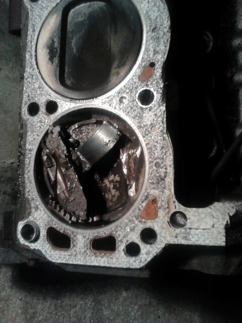 1988 Ford Bronco - top of #8 cylinder. piston was blown the fuck up