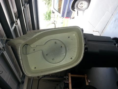 1994 Ford Bronco - An interior car part is shown with visible mounting holes and a textured surface.