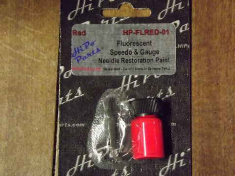 1981 Ford Bronco - This is a bottle of fluorescent red paint for restoring speedo and gauge needles, sold by HiPo Parts.