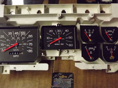 1981 Ford Bronco - Instrument cluster with speedometer, tachometer, fuel, and temperature gauges. Odometer reads 219147.