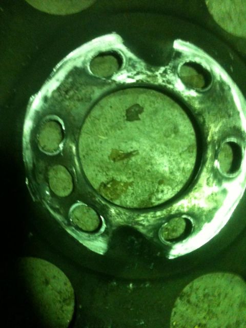 1986 Chevrolet Blazer - Close-up view of a vehicle's wheel hub, showing the lug nut mounting points.