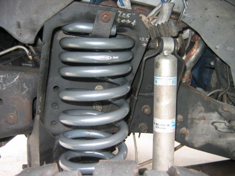 1992 Ford Bronco - Suspension components including a coil spring and shock absorber are shown in detail.