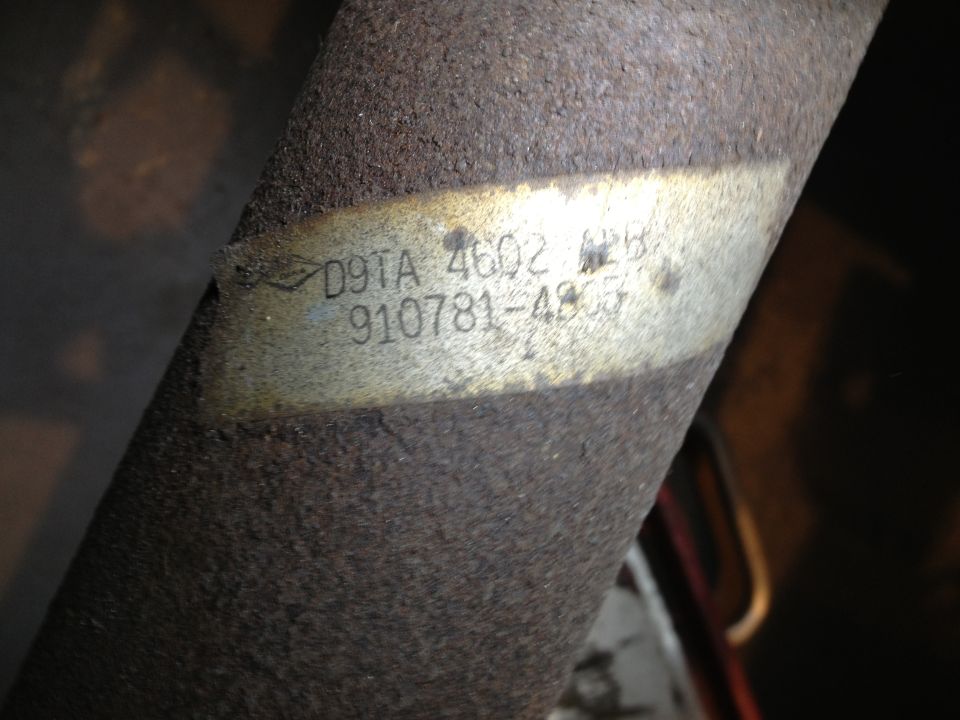 Part with D9TA 4602 and 910781-4805 stamped on a label