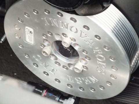 2003 Ford Crown Victoria - Close view of an Innovators West machined pulley with bolt-on hub and ribbed belt surface