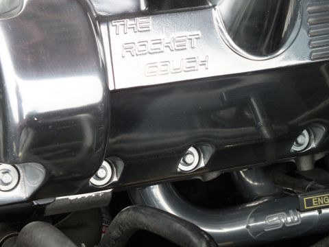 2003 Ford Crown Victoria - Mirror-polished valve or intake cover carrying THE ROCKET COUPE engraving over a row of hex fasteners