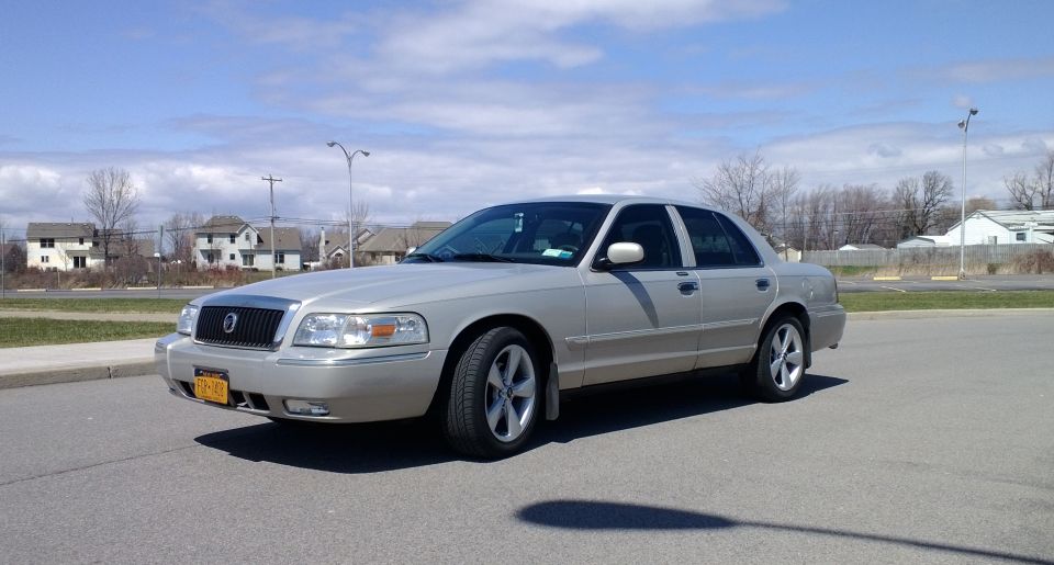 Silver 2008 Mercury Grand Marquis parked on asphalt