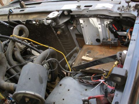 1983 Ford Bronco - The large hole in the CS beside the radiator will be used for winch wiring, which is why there's split loom around its bottom edge. The wir…