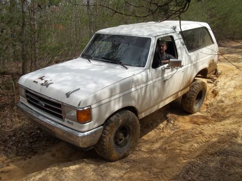 1990 Ford Bronco - This 1990 Ford Bronco navigates a challenging off-road course.