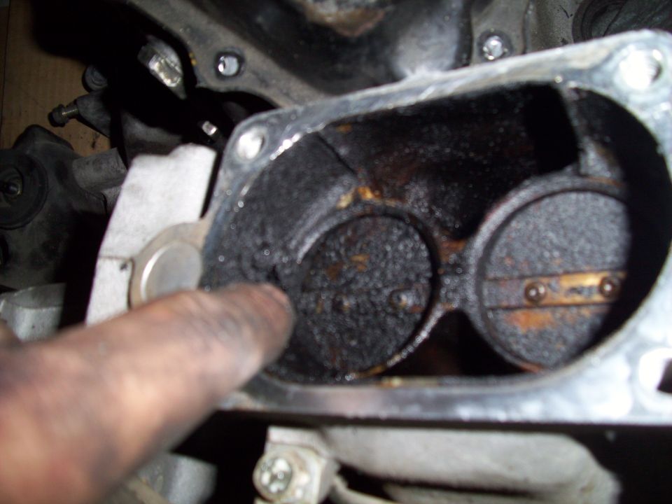 Dirty engine intake manifold with two throttle bodies