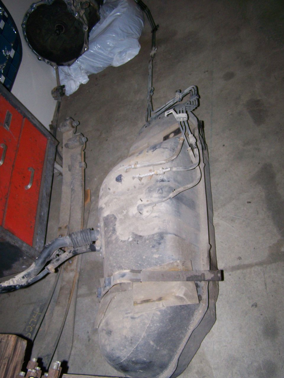 Fuel tank and transmission assembly, possibly from a Suzuki Samurai