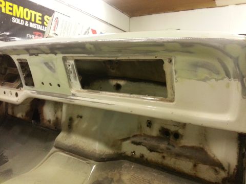 1967 Ford F-100 - This photo shows the interior of a vehicle undergoing restoration, with a focus on the dashboard area and signs of rust.