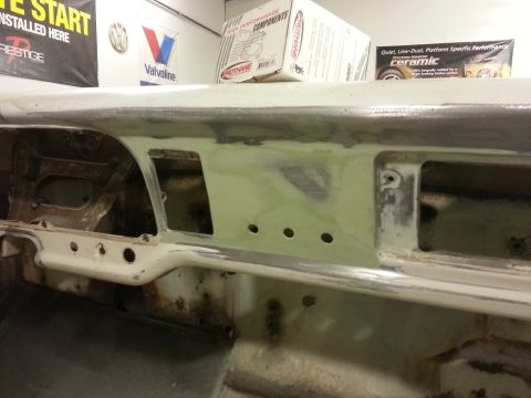 1967 Ford F-100 - Interior view of a 1967 Ford F-100 dashboard undergoing restoration with visible metal and primer.