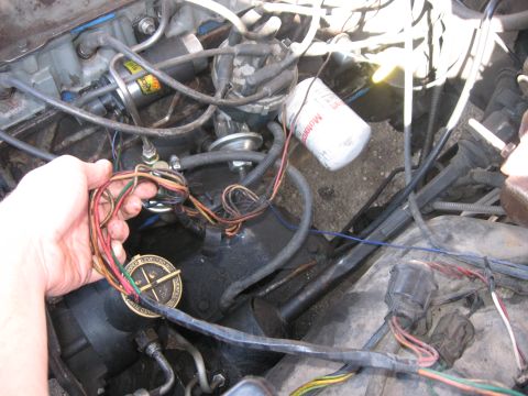 1981 Ford Bronco - Close-up view of an engine bay, showing various wires and engine components.