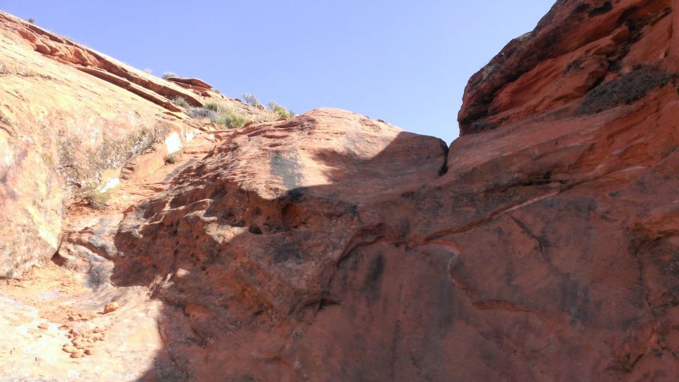 Red rock formations under a clear blue sky