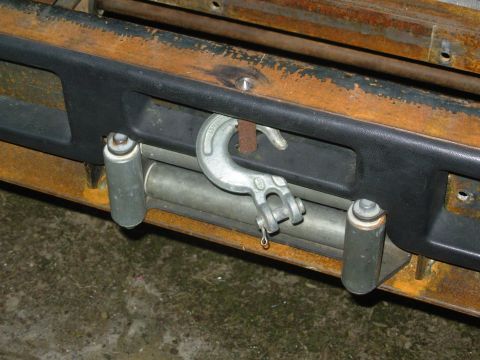 1983 Ford Bronco - It's not welded in yet, but this bar will stow the cable hook and also be strong enough to use as a recovery point. It mimics the plastic d…