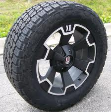 1987 Ford Bronco - XD Series wheel and tire assembly, likely an aftermarket part for a truck or SUV.