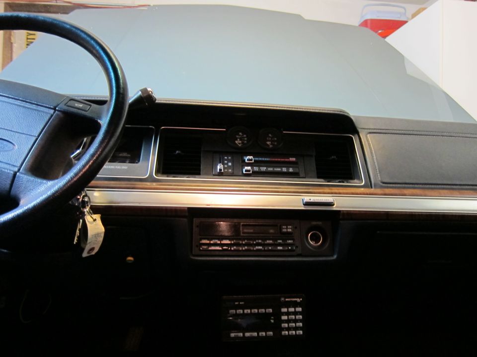 1991 Ford Crown Victoria LTD interior dashboard with wood trim, steering wheel, radio, and climate controls