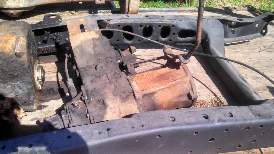 Transfer case and differential assembly on a frame
