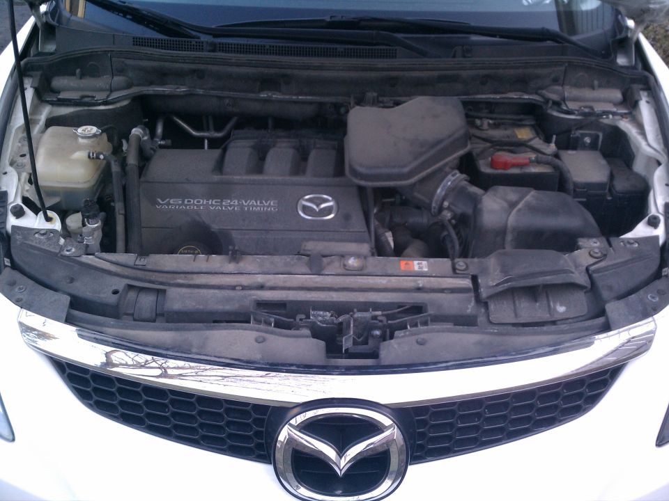 2008 Mazda CX-9 engine bay with V6 DOHC 24-valve engine cover visible