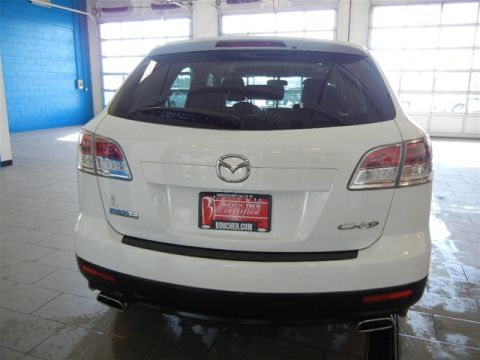 2008 Mazda CX-9 - Rear view of a white 2008 Mazda CX-9 SUV, a 'Boucher Certified' dealer plate and 'CX-9' badging.