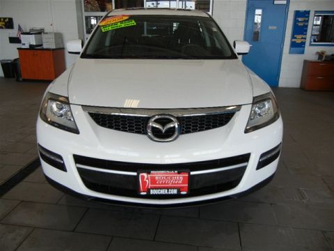 2008 Mazda CX-9 - Front view of a white 2008 Mazda CX-9 SUV, a dealer certification tag on the front bumper.