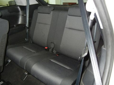 2008 Mazda CX-9 - Interior view of the rear seats and seatbelts in a 2008 Mazda CX-9.