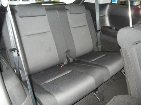 2008 Mazda CX-9 - The rear seating area of a vehicle is shown from a side angle.