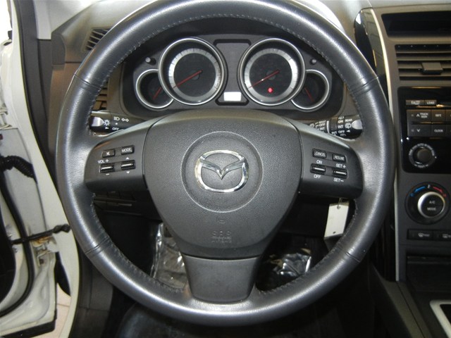 2008 Mazda CX-9 interior with steering wheel and dashboard