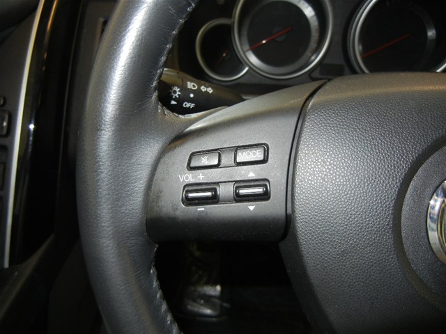 2008 Mazda CX-9 steering wheel with mode and volume controls