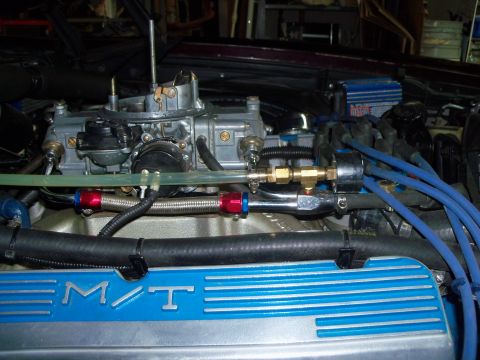 1979 Ford Ranchero - Bypass fuel return plumbed at the carb supply line. #60 Holley fuel jet epoxied into hosebarb fitting prior to clear fuel hose. Clear fuel…