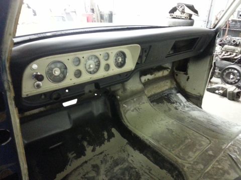 1967 Ford F-100 - Interior view of a 1967 Ford F-100, highlighting the dashboard and floor.